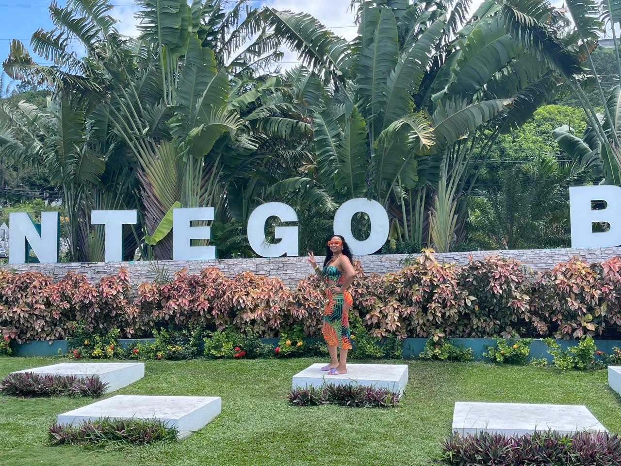 Guest at Montego Bay sign